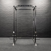 Thumbnail for A weight lifting rack presented in a home gym setting