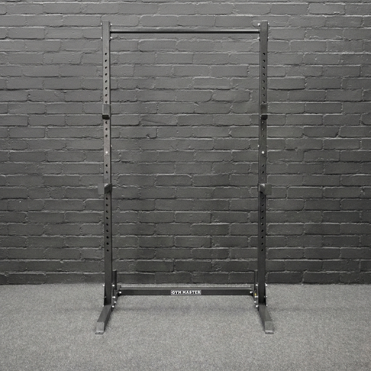 Front on shot of adjustable squat rack stand in gym background
