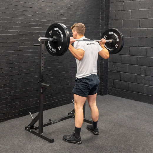 Squat Rack With Barbell and Weights
